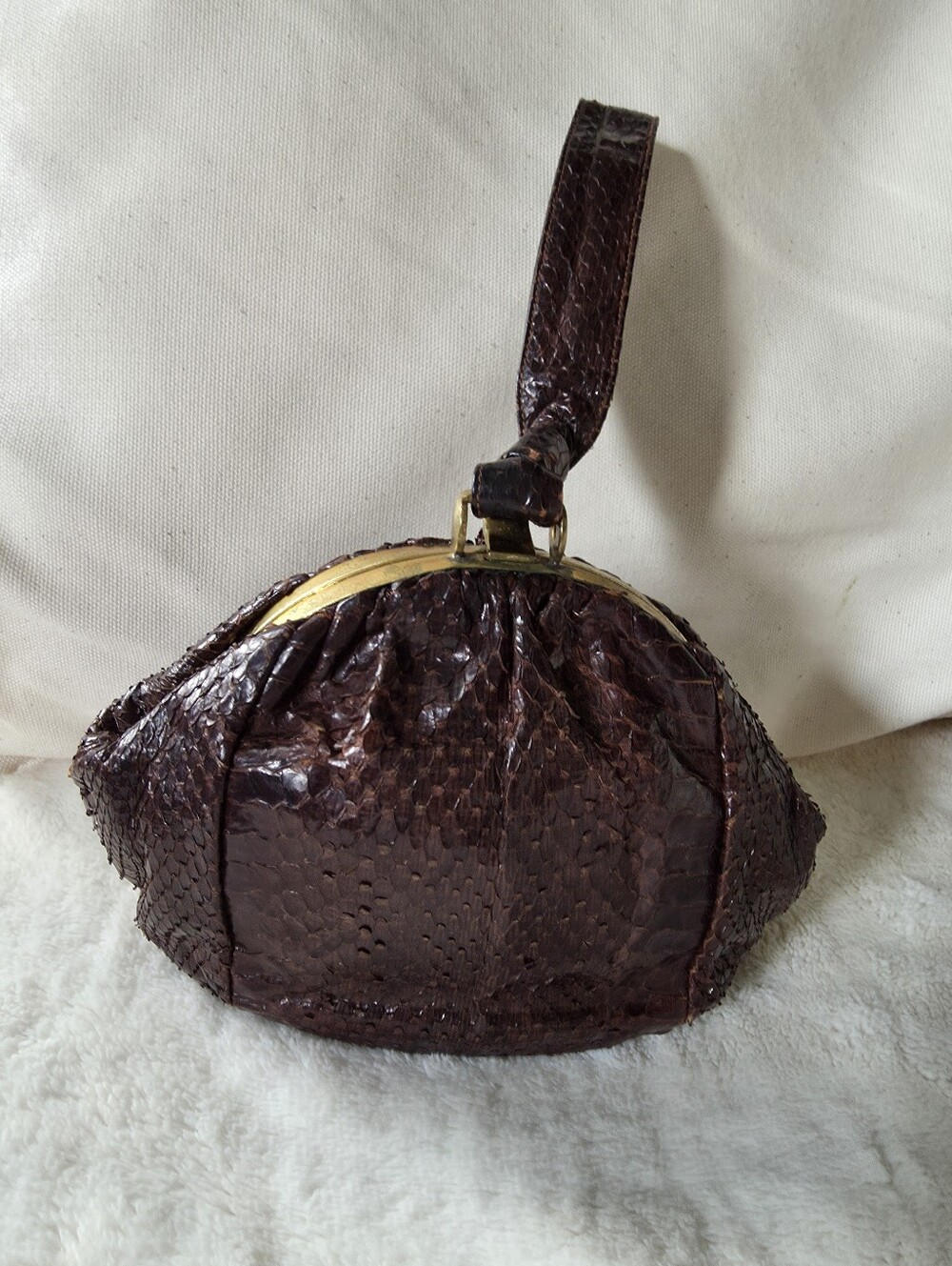 Art Deco Antique vintage brown snakeskin handbag features a structured frame